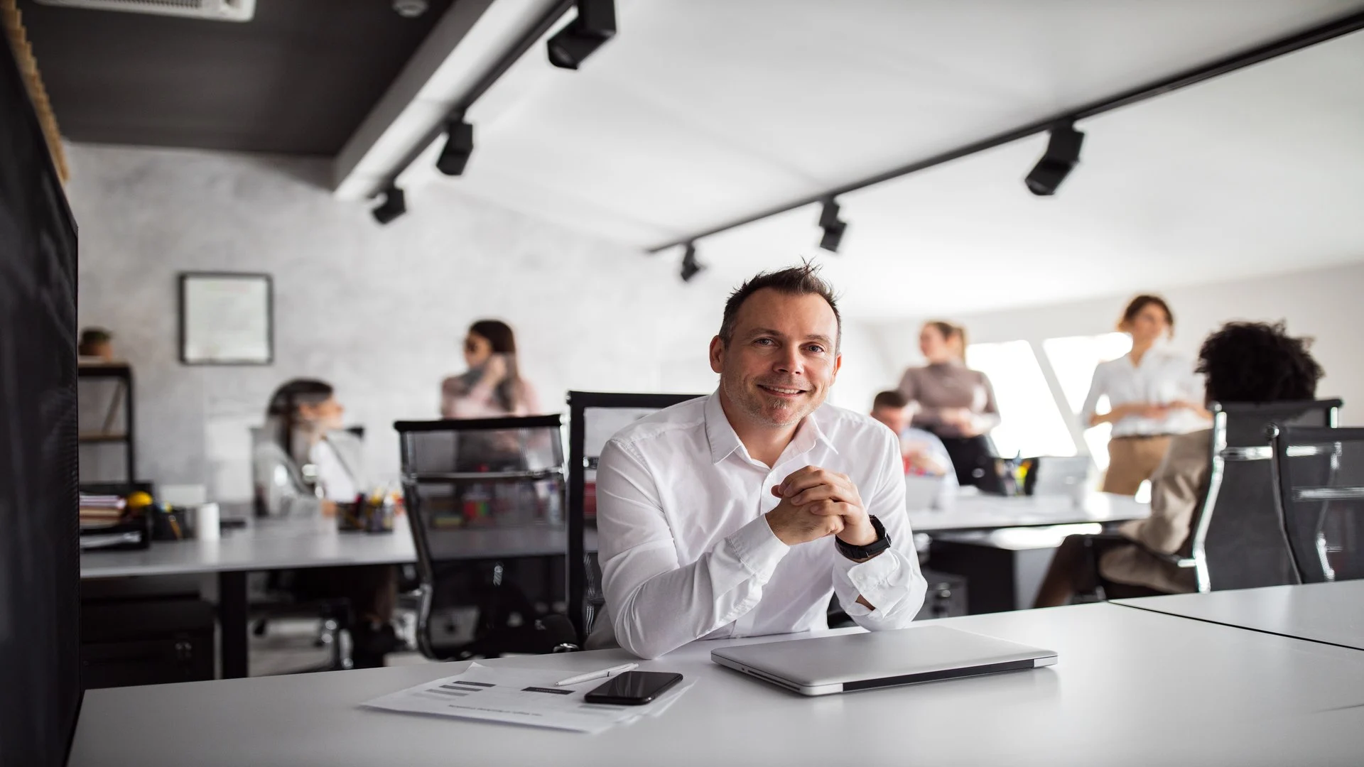 Man sitting at desk with computer. Human resource knowledge. HR Consulting.